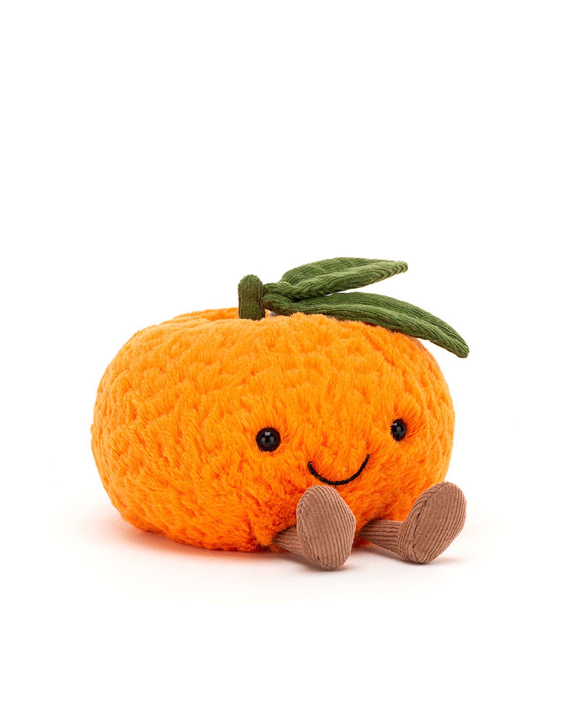 The Amuseables Clementine SM by Jelly Cat Inc. is a plush toy shaped like an orange, featuring a textured surface, green felt leaf, stitched smile, and corduroy legs—a charming festive gift ideal for Christmas stockings.