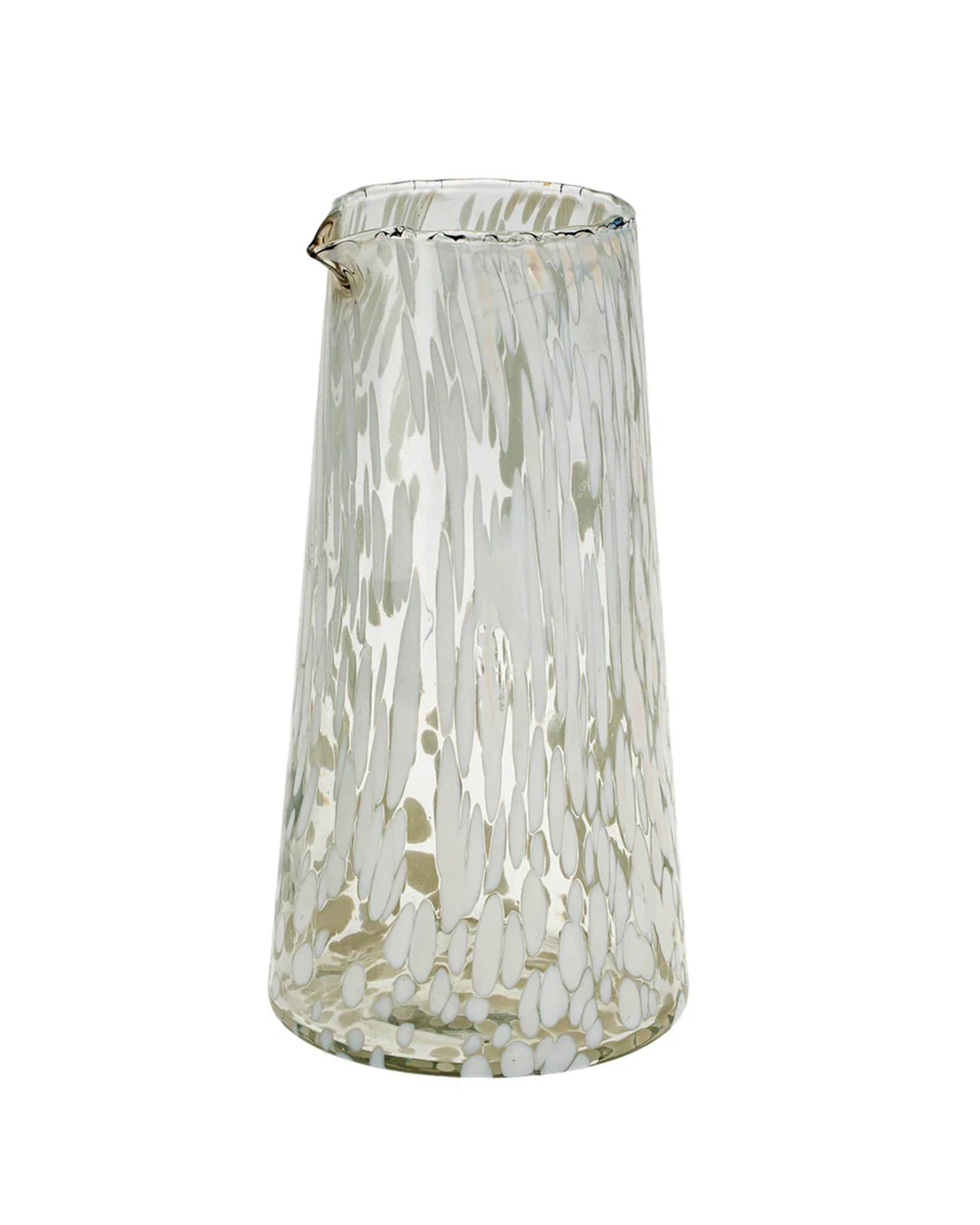 The Indaba 4-7188 Confetti Carafe L is a handblown glass pitcher from India, clear with a subtle white speckled pattern, a gently flared base, tapered top, and small spout.