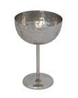The Creative Co-op Stainless Steel Coupe Glass features a hammered finish and elegant stem, bringing sophistication to any setting.
