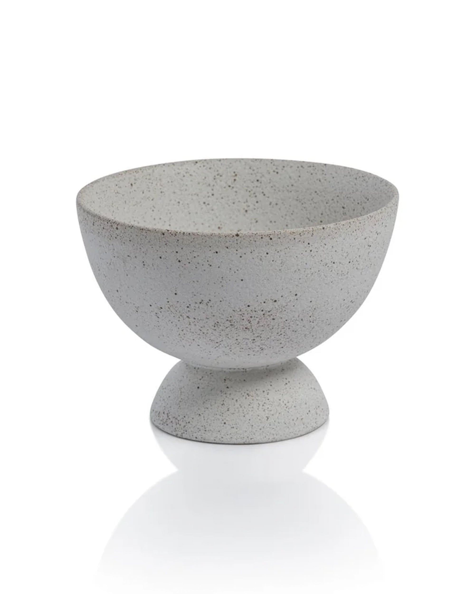 The CH-7291 Cove Ceramic Footed Bowl by Zodax features a speckled gray finish, wide rim, and rounded base on a matching pedestal, making it a striking decorative accent for any setting. Displayed against a white background.