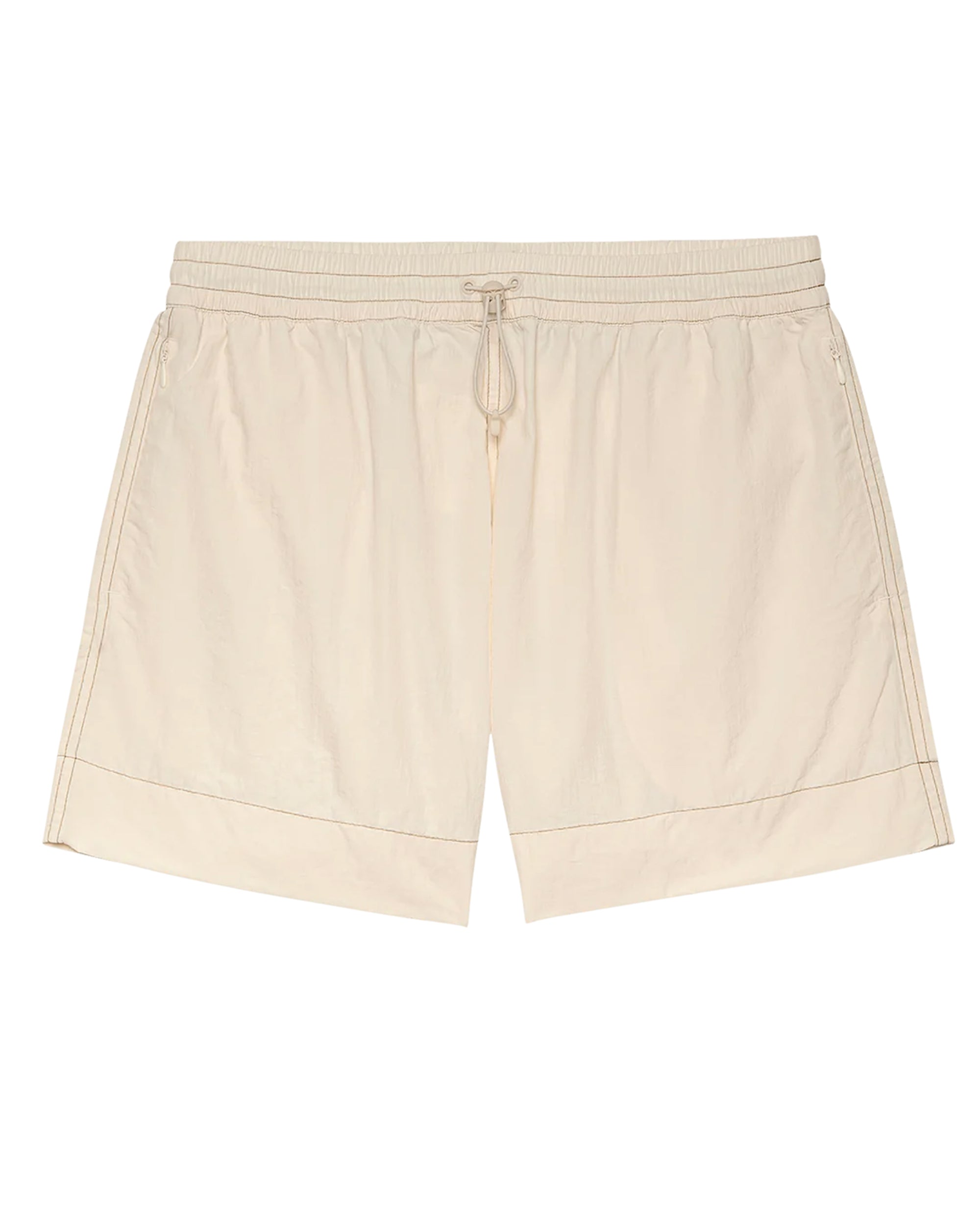 The Rover Short by The Great Inc. features a relaxed fit, beige durable fabric, elastic waistband, and side pockets, shown laid flat on a white background.