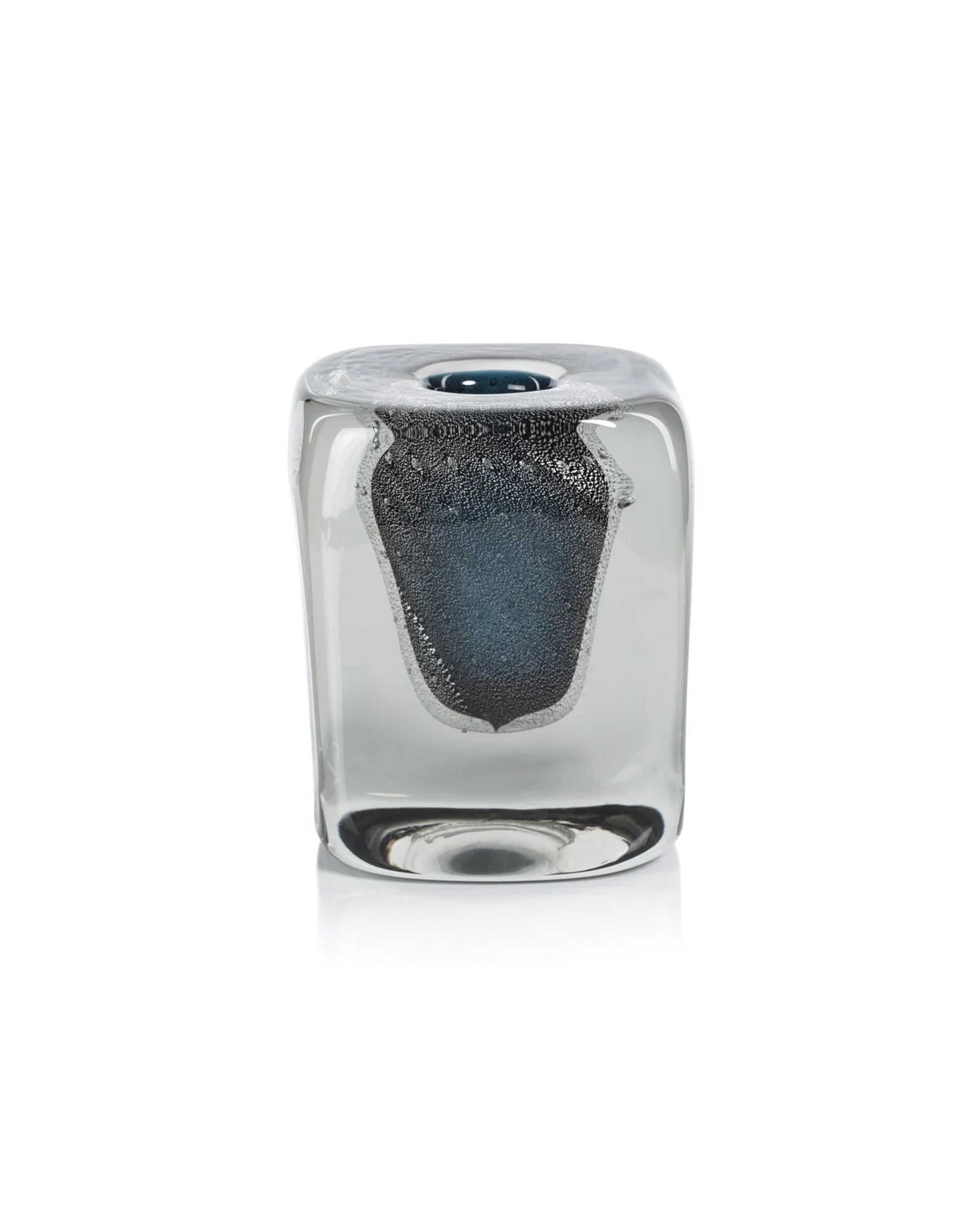 An elegant Zodax glass paperweight with a rounded rectangular shape and a textured dark metallic form inside—perfect as home decor or paired with the CH-7277 Crystal Bloom Vase.