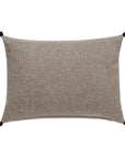 The CRISTOBAL FAUX LEATHER pillow by Eastern Accents is a rectangular, light brown decorative accent with a soft texture and small dark tassels on each corner, shown against a white background.