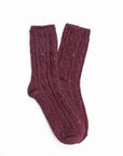 The Faire Wool Speckled Knit Socks are maroon, ribbed, and feature a wool blend with multicolored speckles, shown laid flat on a white background.