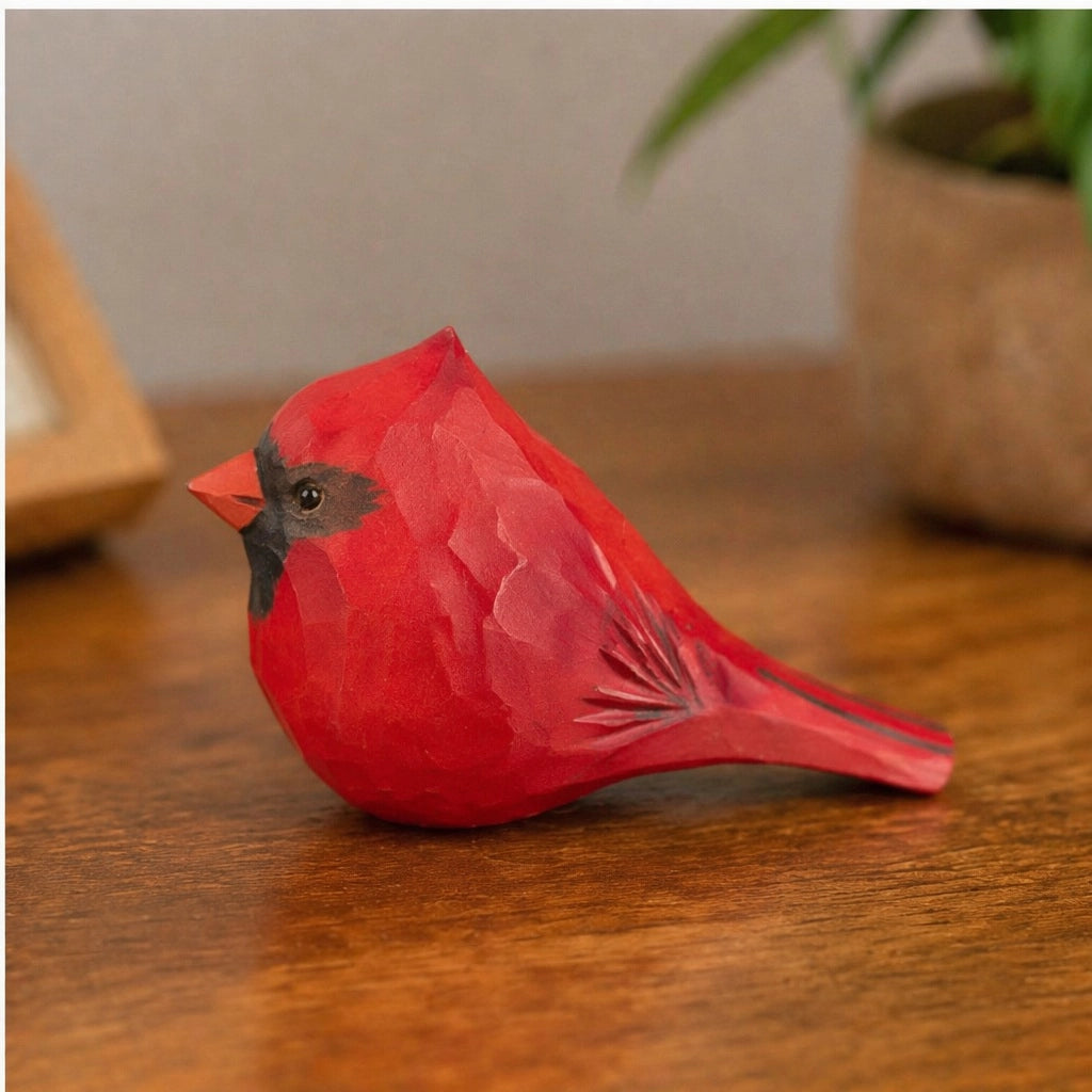Hand-painted red wood bird figurine by Faire, a charming accent for potted plants, from Bungalow Furniture &amp; Accessories.