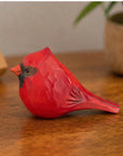 Hand-painted red wood bird figurine by Faire, a charming accent for potted plants, from Bungalow Furniture & Accessories.