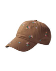 The Faire Ditsy Dahlia Baseball Cap features an adjustable strap and is adorned with small, colorful embroidered flowers—ideal for a Garden Party look. Shown here against a white background.