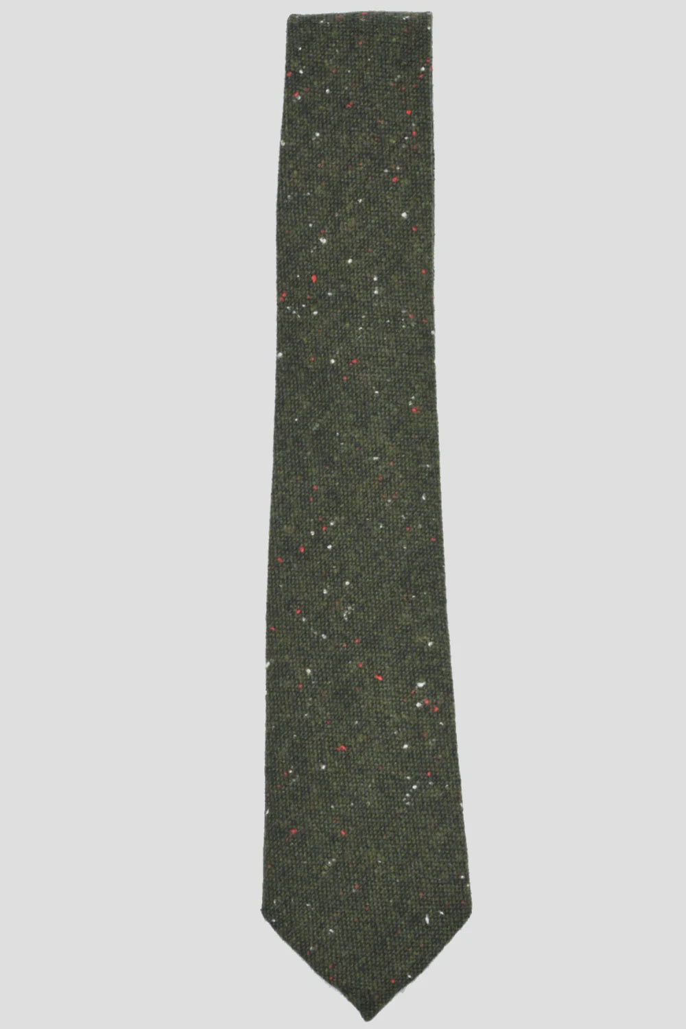 Introducing the MENS Speckled Dark Green Wool Tie by Curated Basics: Crafted from 100% wool, this tie showcases an elegant texture with white and red speckles set against a muted dark green backdrop. With a width of 2 3/4", it effortlessly merges style and sophistication.