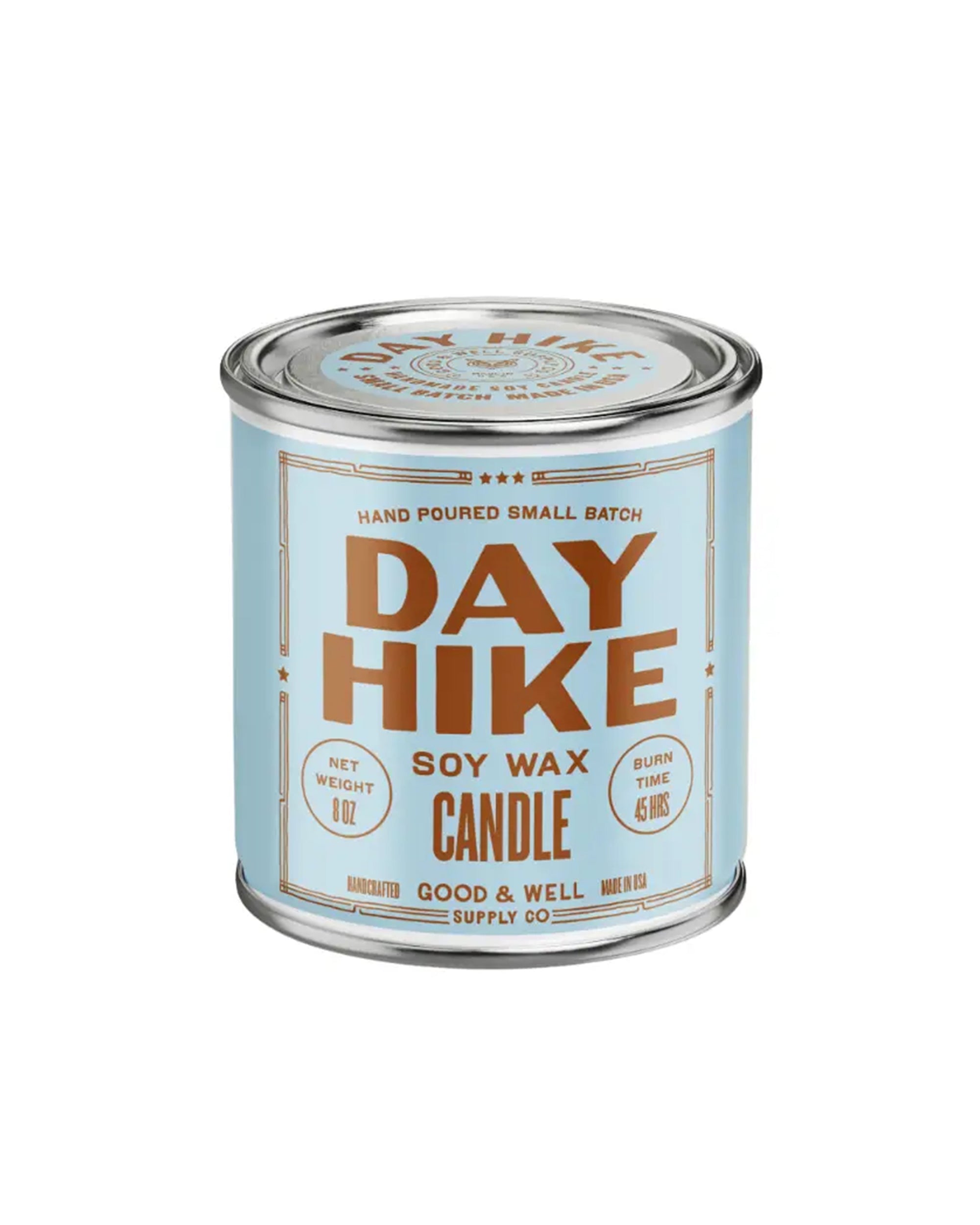 A light blue tin labeled "G&W Soy Candle" with copper-colored text and scent notes, 6 oz net weight, 45-hour burn time, from the Happy Place Collection by Faire, is shown on a white background.