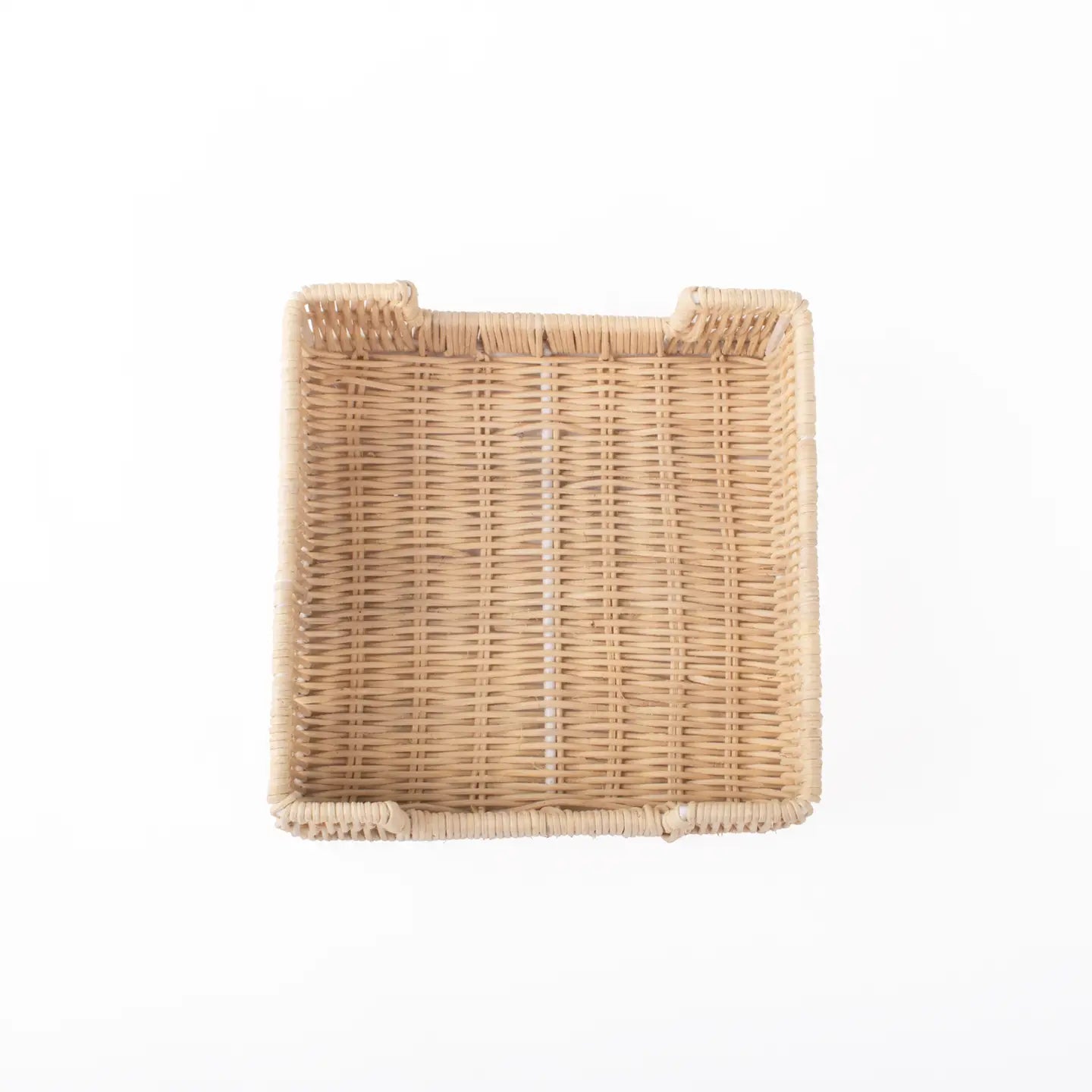 The Faire Rattan Bev Napkin Tray is crafted from natural rattan with a tightly woven pattern and slightly raised edges, making it ideal for use as a handcrafted cocktail napkin tray, displayed against a plain white background.