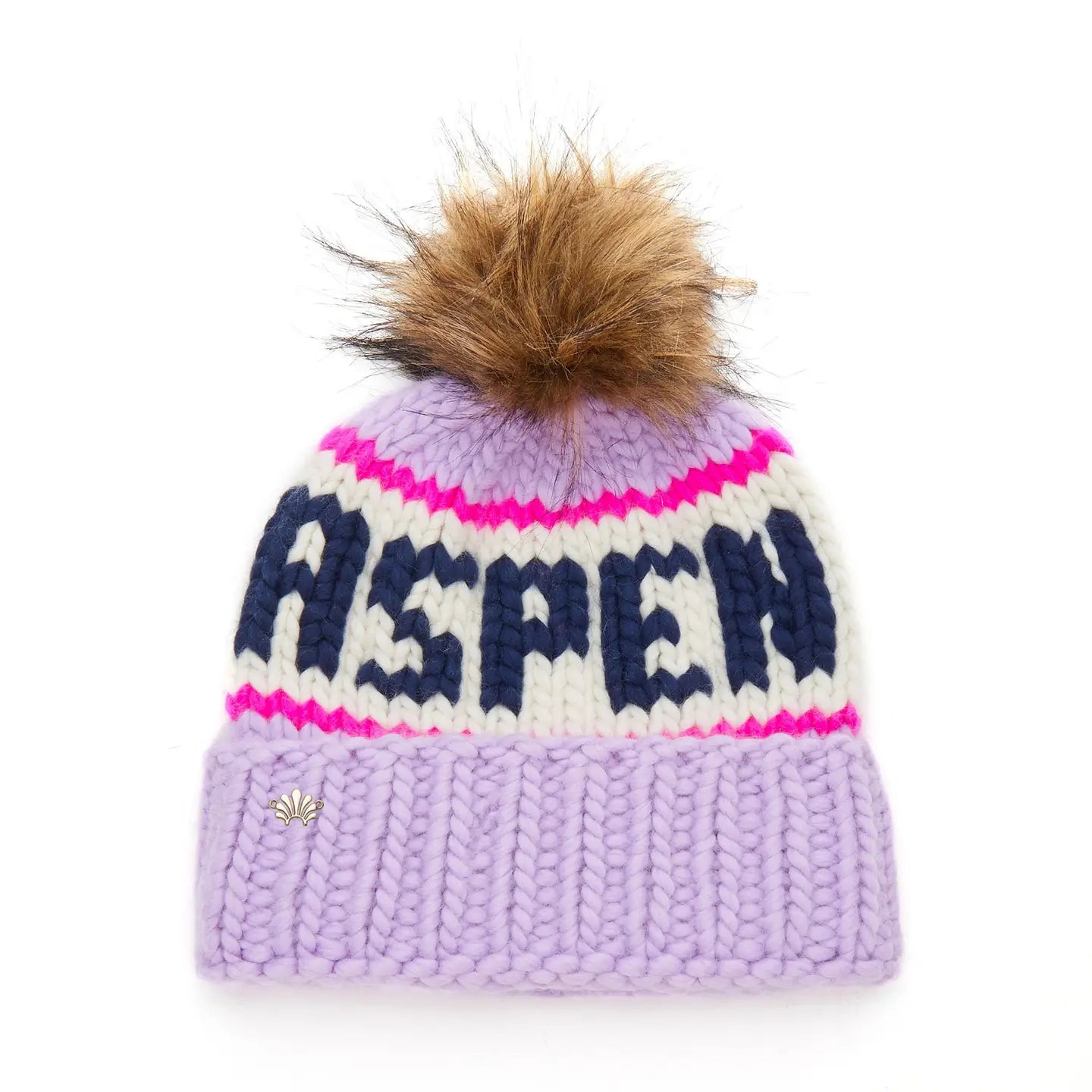 The Faire Knit Ski Hat is a luxury lavender beanie featuring a thick fold-over brim, white and pink stripes, bold navy "ASPEN" lettering, and topped with a large brown faux fur pom pom.