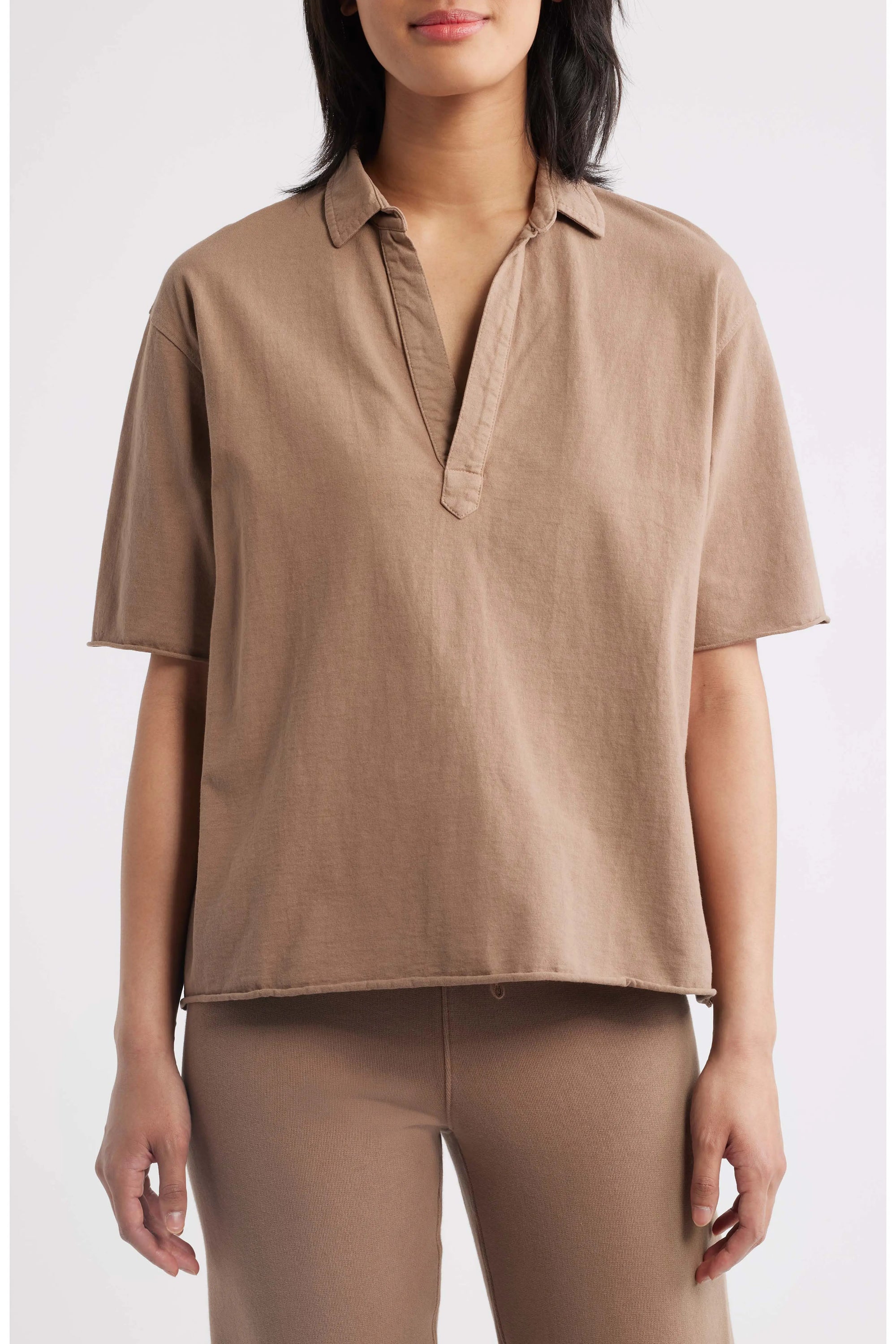 Patty Popover SS Henley by Frank &amp; Eileen in white with tan pants, styled simply against a neutral background.