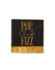 The MME Napkin by Faire is a black napkin with gold foil accents on the bottom edge, featuring the phrase "POP Clink FIZZ" in gold lettering.