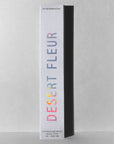 A white textured box displays "Desert Fleur Incense Sticks | Earthy & Iconic" by Faire, with 15 premium hand-rolled sticks (1+ hr burn). Enjoy a botanical incense experience featuring an earthy patchouli vanilla aroma.