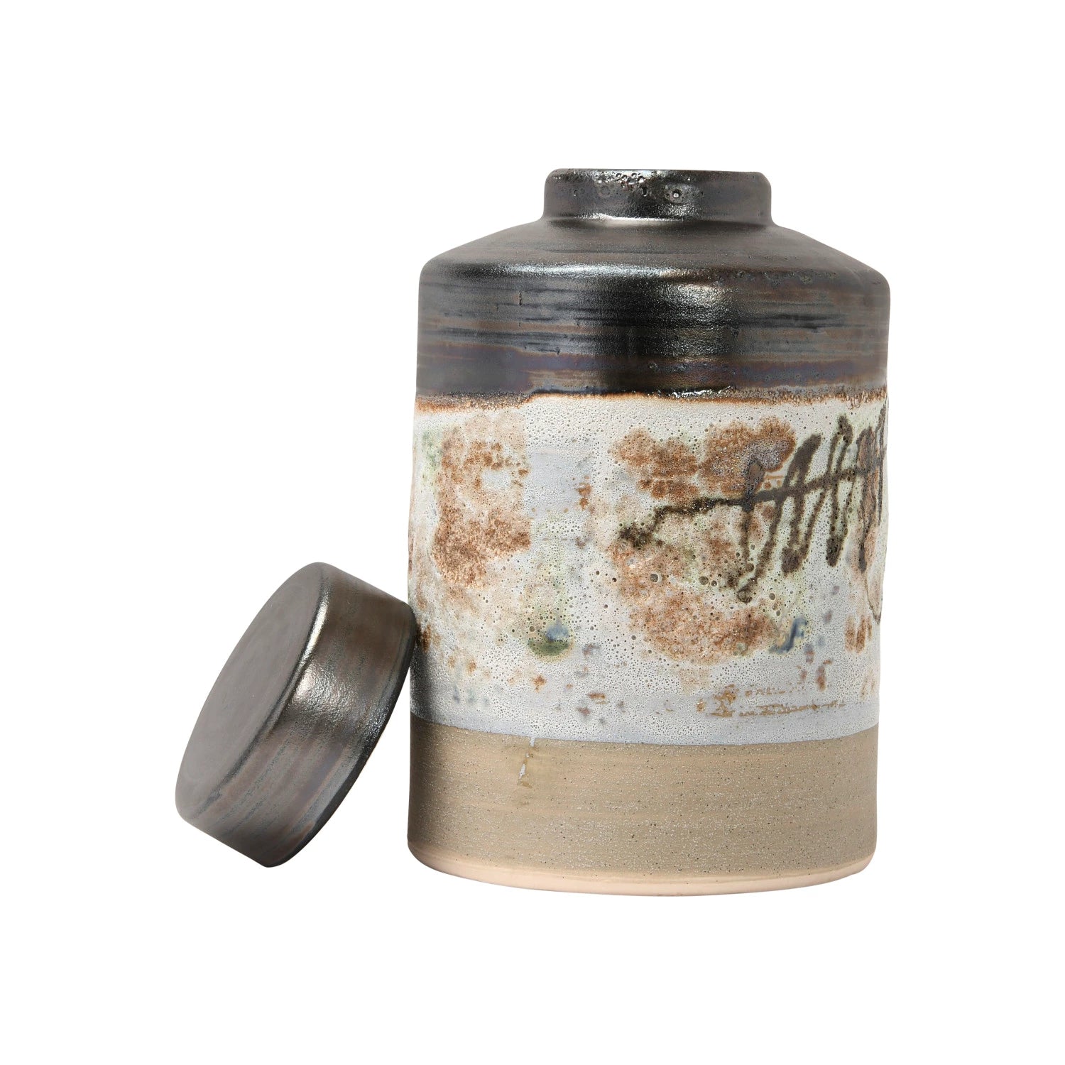 The Creative Co-op Ginger Jar is a hand-painted stoneware piece featuring earthy brown, beige, and white tones with abstract patterns and a glossy, reactive glaze on top. It comes with a round lid placed beside the jar.