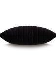 The DOMINIQUE CHANNELED by Eastern Accents is a rectangular black velvet decorative pillow with horizontal quilting lines, displayed against a white background.