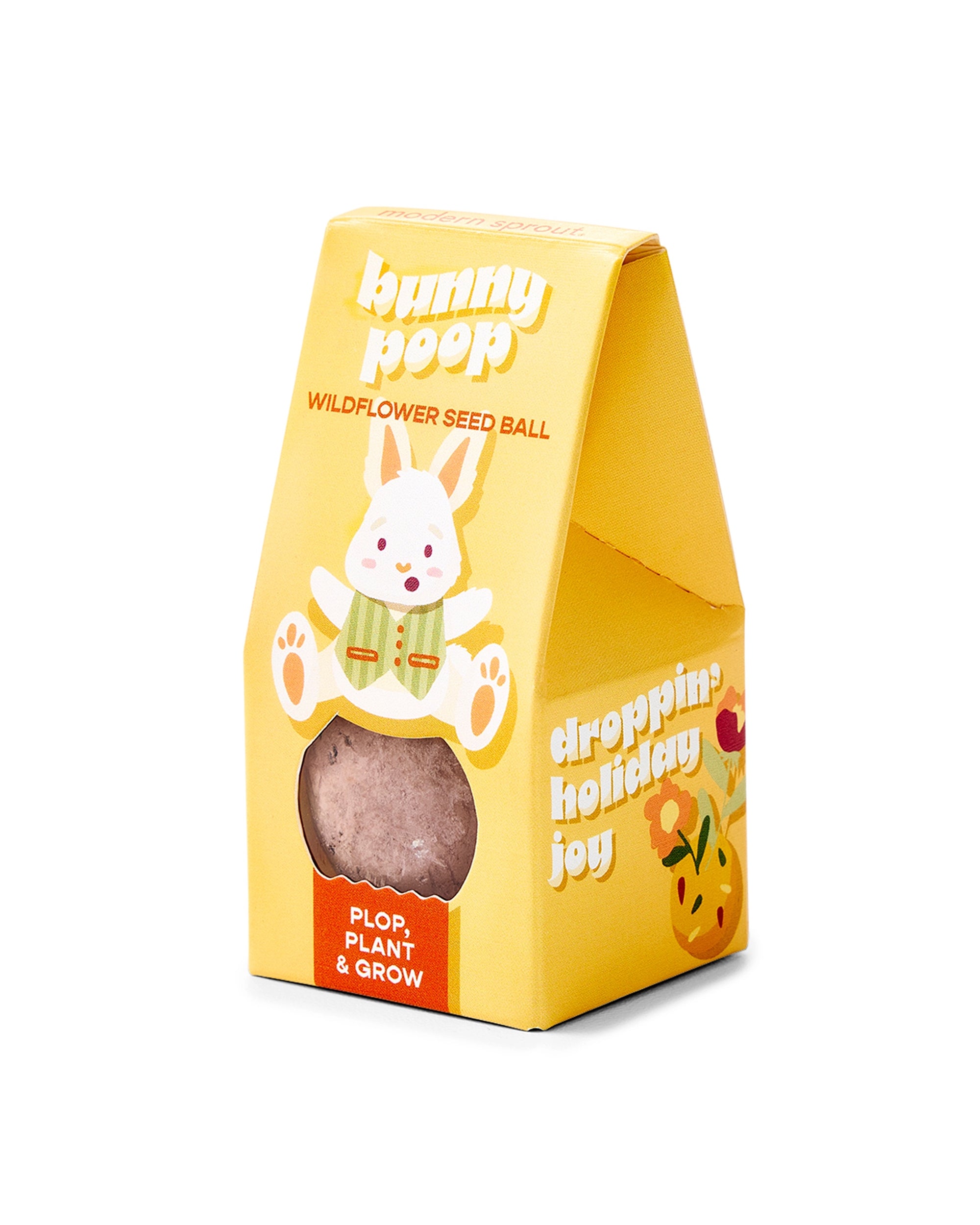 The "Easter Plops" by Faire is a yellow box labeled "bunny poop" containing a wildflower seed ball, decorated with a cute cartoon bunny and festive graphics, plus playful text: "plop, plant & grow" and "droppin’ holiday joy.