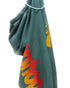 A green Artyard Yumm OG Sweatpant by Free City (sparrow, LLC) with yellow and red partially visible text, hand-screen printed, is shown hanging on a white plastic hanger against a white background.