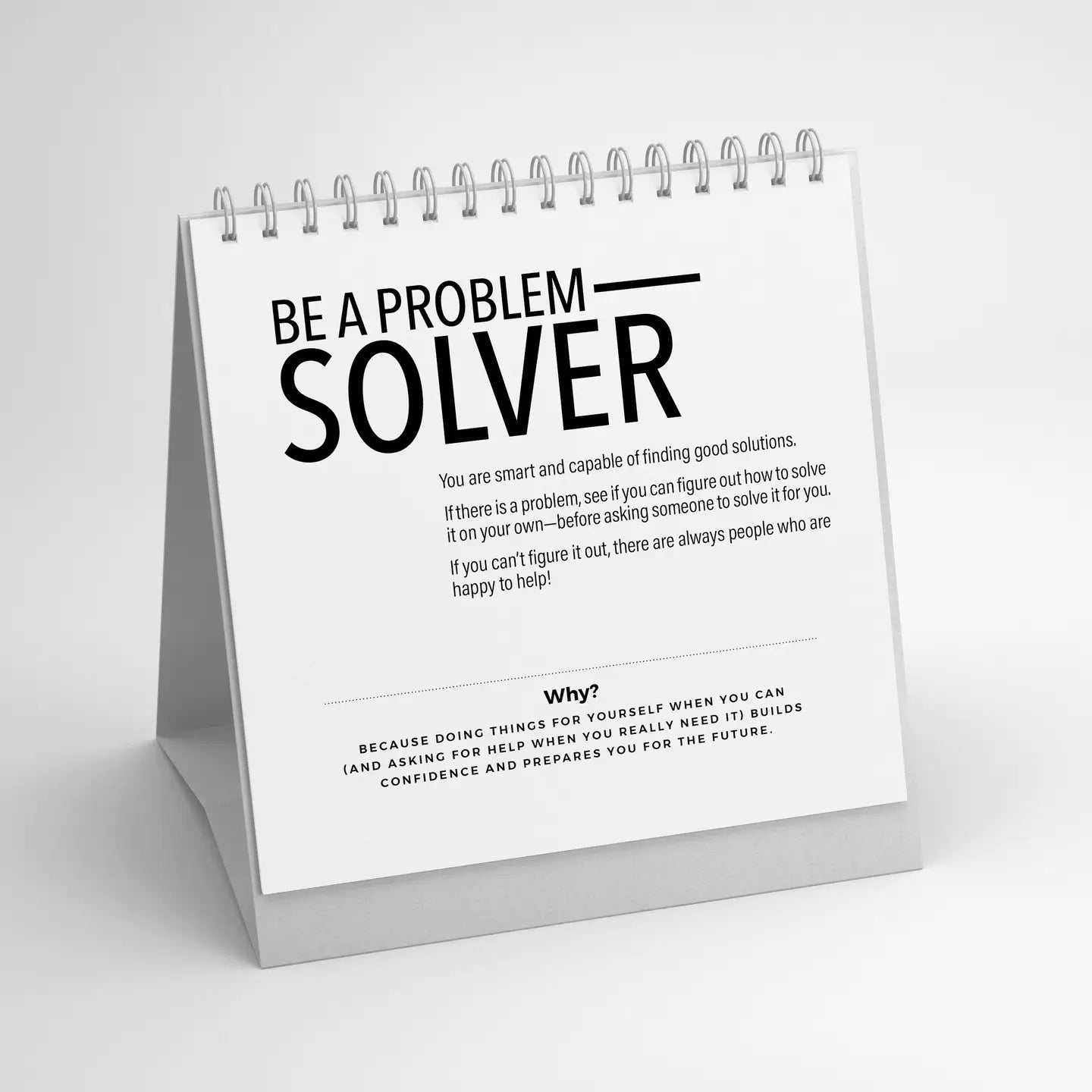 The Faire 52 Modern Manners white desk calendar displays “Be a Problem Solver” in bold black text, offering motivational advice to help kids and parents build confidence and independence for a brighter future.