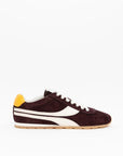 The ONCEPT Essex Sneaker is an ultra-lightweight, dark brown Italian suede shoe with white laces, a side white stripe, and a yellow heel accent, shown on a white background.