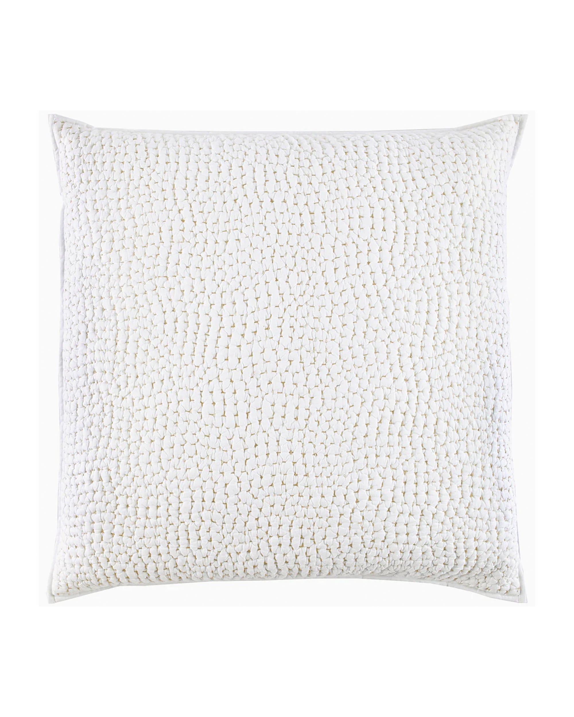 The Sand Euro pillow by John Robshaw features a square shape and white organic cotton voile with a raised dot texture, offering stylish comfort and year-round usability.