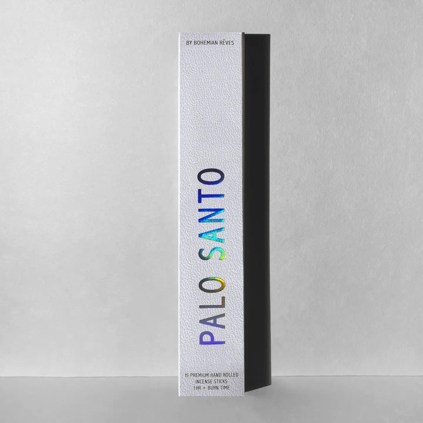 A white box of Faire Incense Sticks features black and blue text and is infused with the essence of Patchouli.