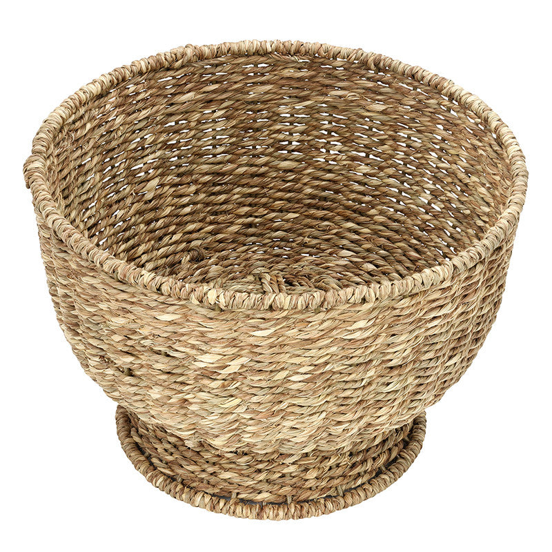 Large handwoven seagrass basket with wide opening, sturdy design by Faire’s Face to Face for stylish storage.