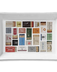 Ceramic tray in Napa color by Faire displaying assorted matchbooks, perfect for a stylish, organized accent.