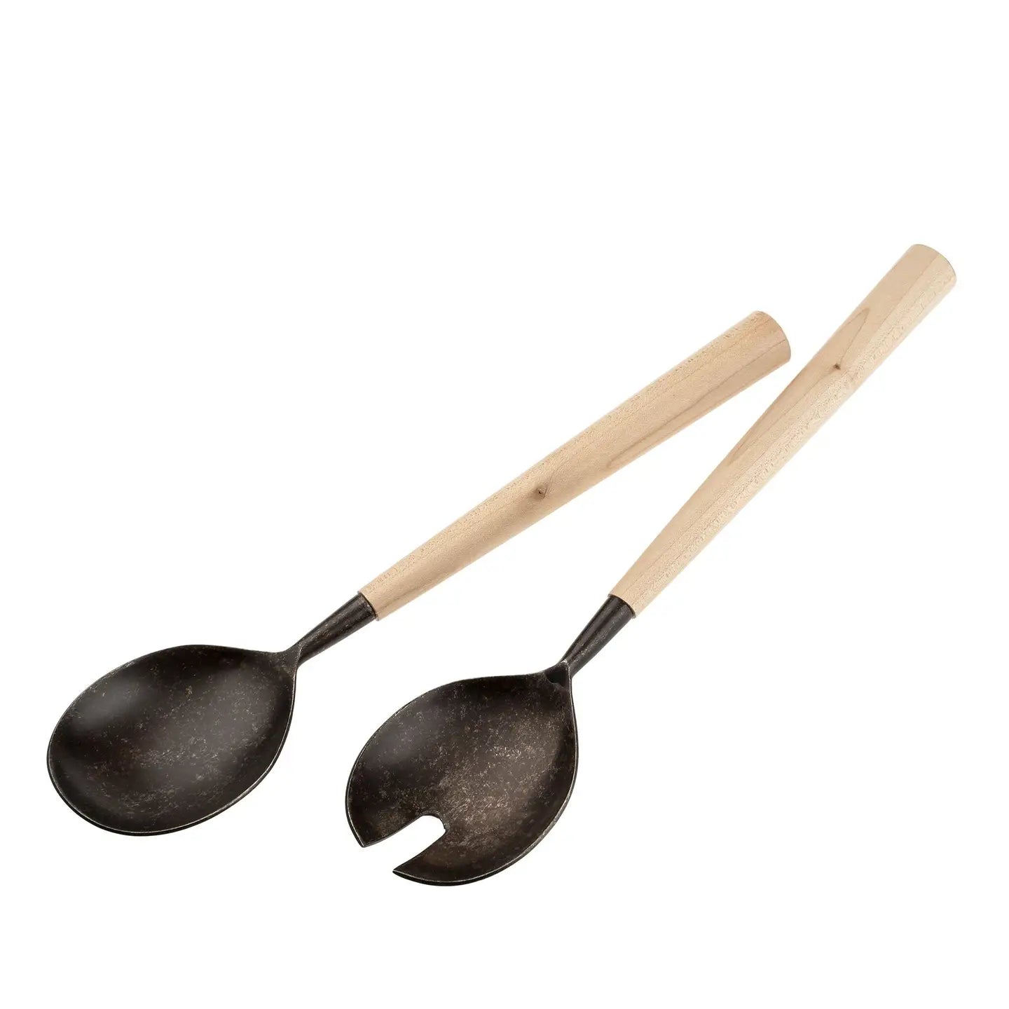 The Indaba Maple Salad Servers feature maple wood handles and black, speckled metal heads—a solid spoon and a forked spoon. These stylish utensils make a thoughtful hostess gift for any gathering.