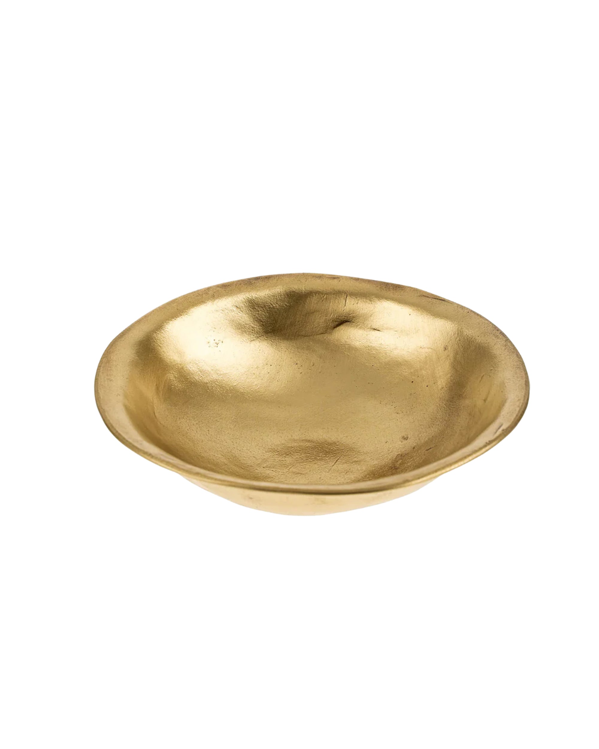 The Indaba 1-1234 Forged Brass Bowl is a shallow, round handmade piece with a smooth, slightly uneven finish—ideal as a catchall—shown here on a plain white background.