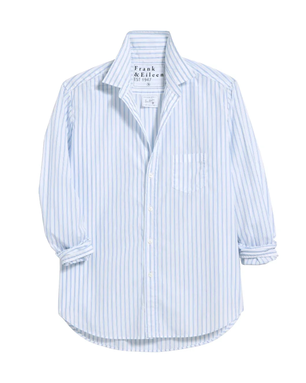 The EILEEN Relaxed Button-Up Shirt by Frank & Eileen features a light blue and white vertical stripe, long sleeves, a collar, front pocket, and label inside the collar. The fit is relaxed with sleeves slightly rolled up.