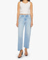 A person in The Dodger Ankle loose straight leg jeans by Mother, paired with a white sleeveless top and clear high-heeled sandals, stands against a white background.