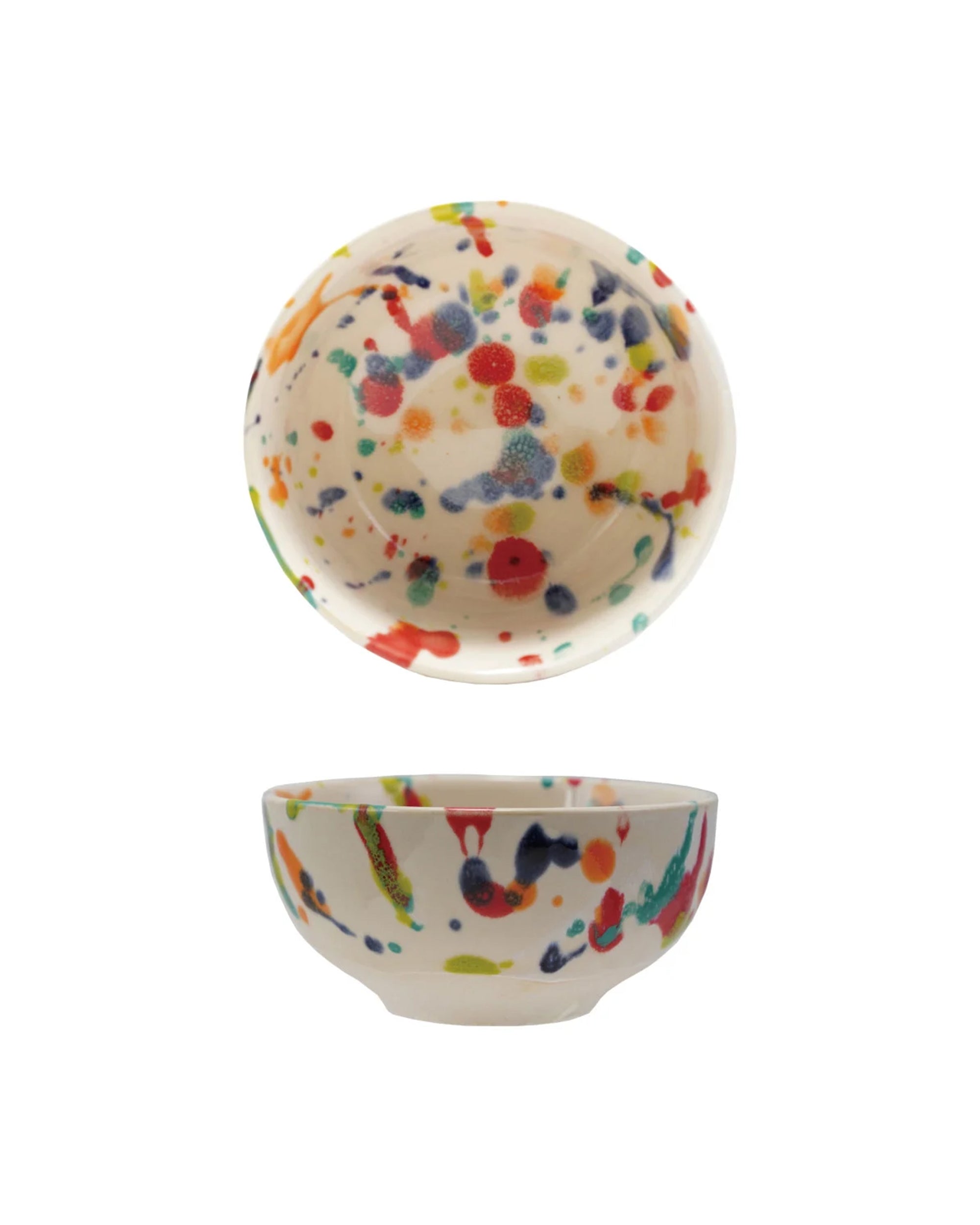 The Rainbow Splatter Stoneware Bowl by Bloomingville features a white base with vibrant red, blue, green, yellow, and orange paint splatters. This handmade bowl adds artisanal flair and rustic charm to your home decor. Shown from top and side views.