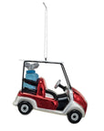 The Creative Co-op Glass Golf Cart Ornament features a red and white cart with a blue glitter golf bag, hanging by a silver string—ideal as a festive golf decoration or gift for any fan.