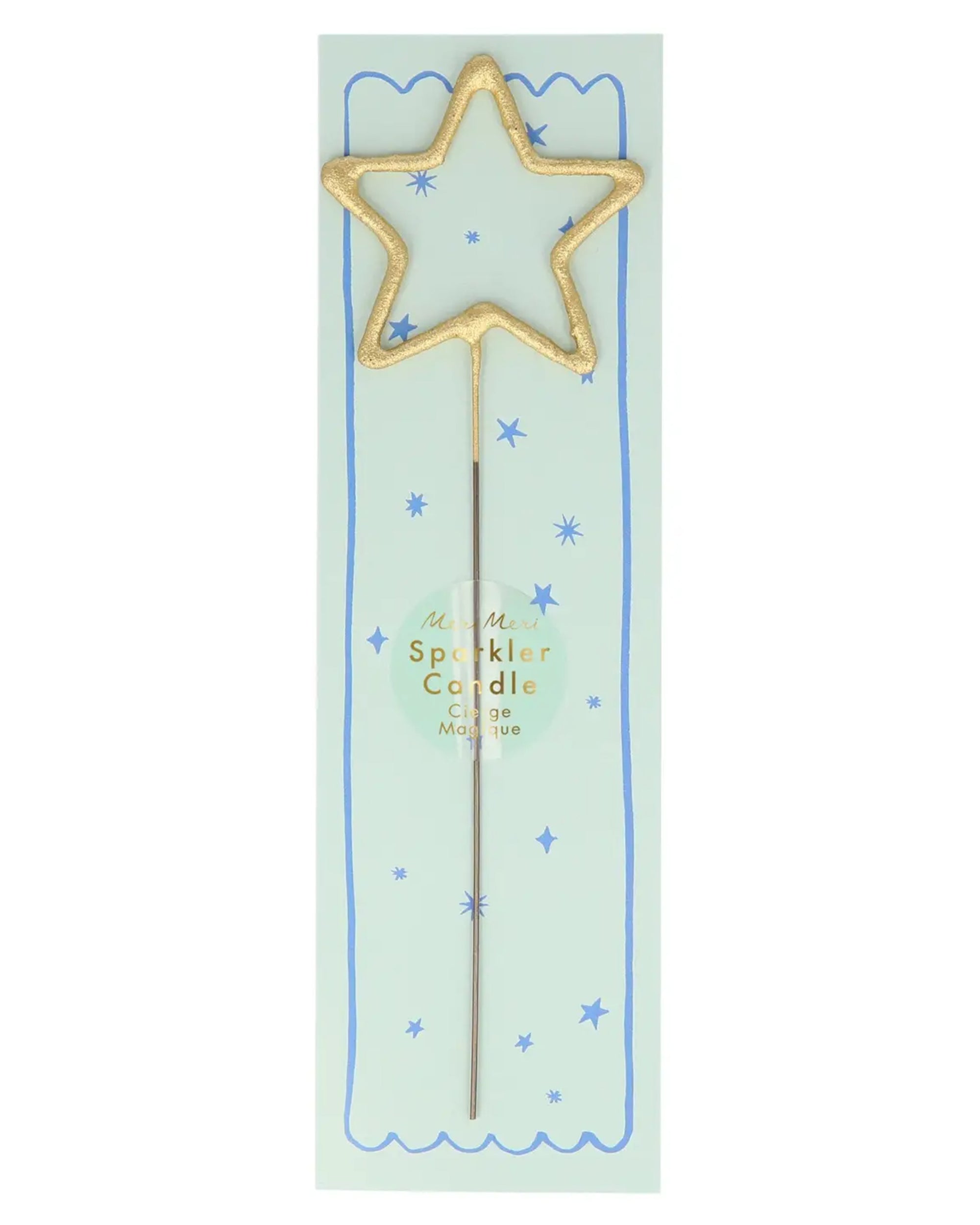 The Faire Gold Sparkler Star Candle features a gold star-shaped sparkler on a metal stick, displayed in star-themed blue packaging labeled “Sparkler Candle.” Add sparkling shine to celebrations with this festive candle.