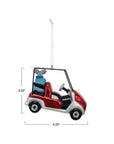 The Creative Co-op Glass Golf Cart Ornament features a small red and silver cart with golf clubs in the back, measures 3.25" tall and 4.25" long, and hangs by a string—a unique gift or decoration for golf fans.