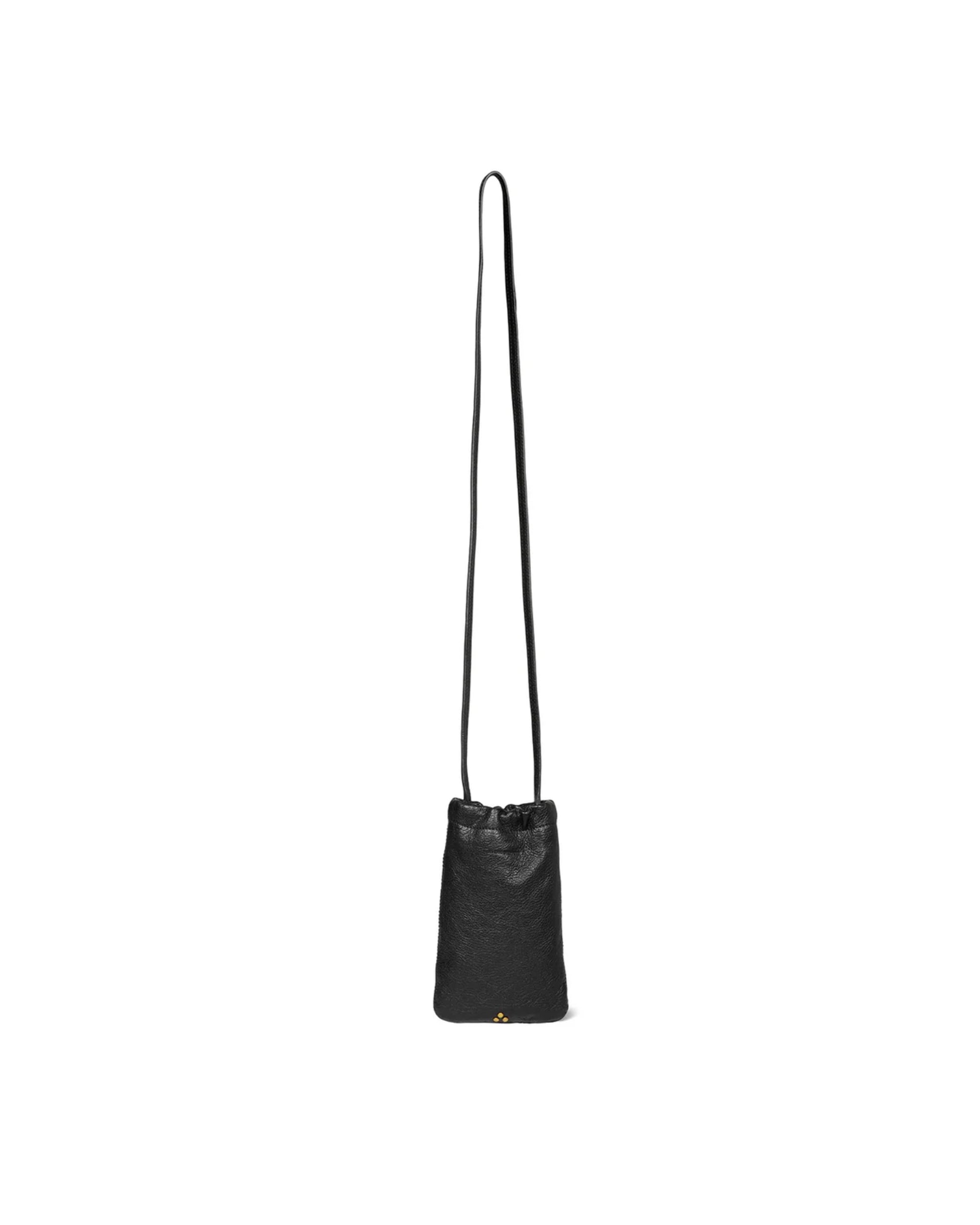 The Gordi Mobile by Jerome Dreyfuss is a small black goatskin leather crossbody bag with a long, slim shoulder strap and minimalist design, shown against a white background.