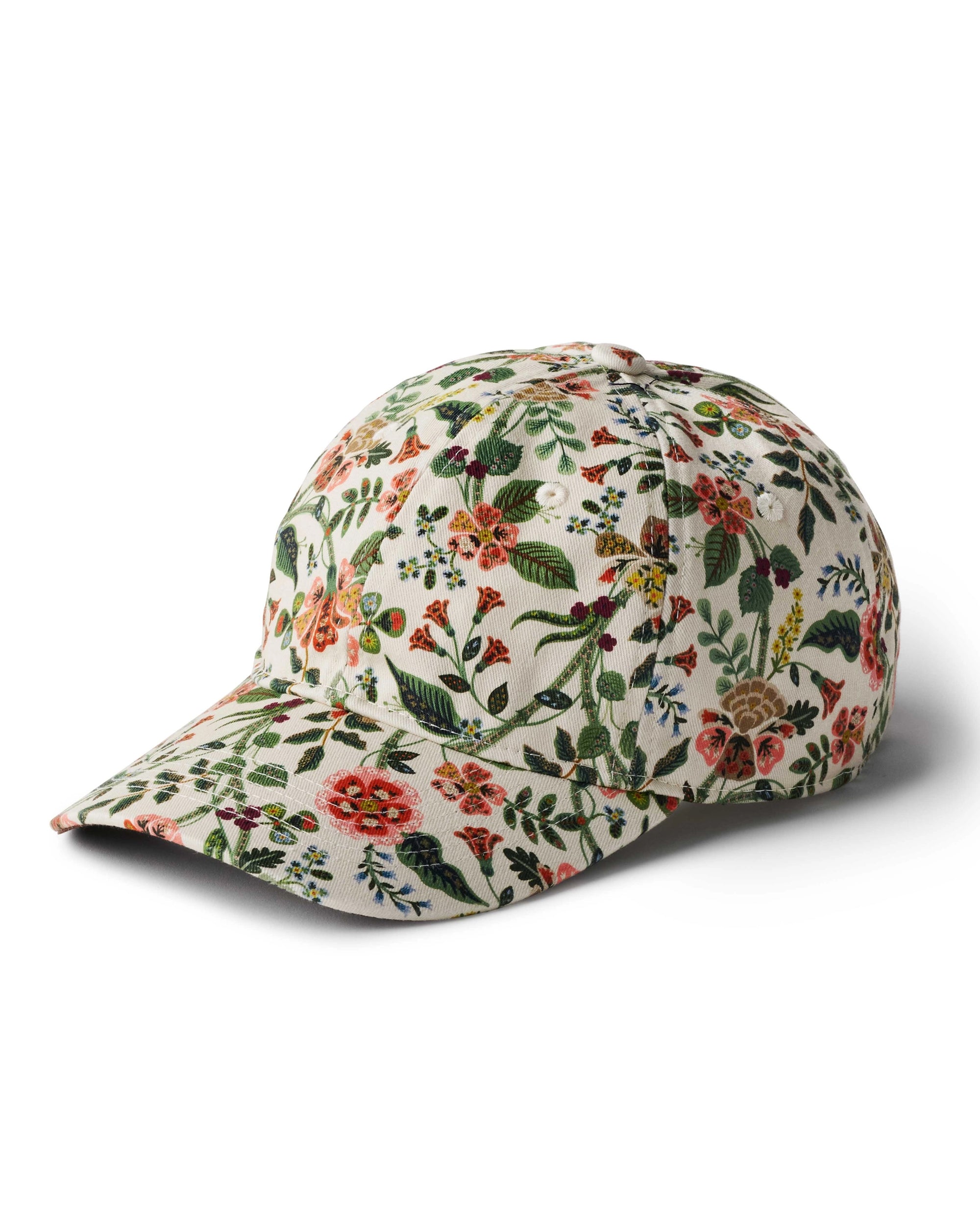 The Faire Gracie Baseball Cap features a white background with a vibrant floral print of green leaves and red, orange, and yellow flowers, plus an adjustable strap for a comfortable fit.