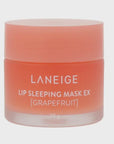 A container of Faire Lip Mask EX in Grapefruit flavor, featuring a translucent peach-colored jar with the product name printed in Arizona style white.