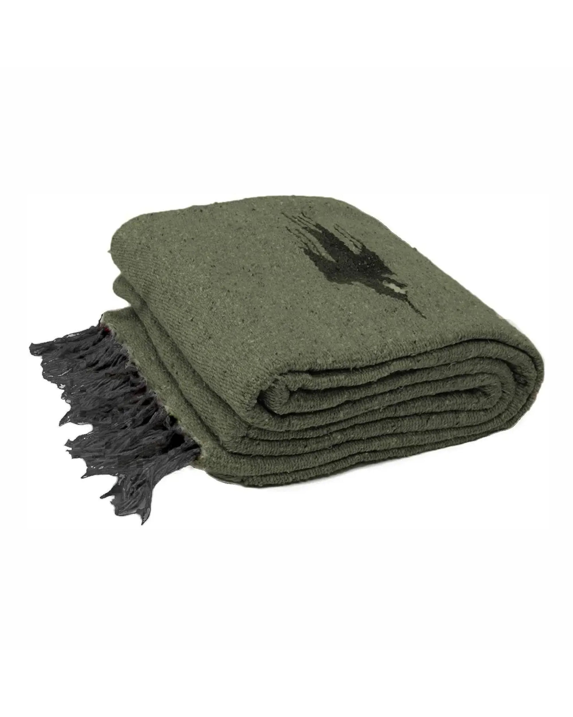 The Faire Olive Green Baja Thunderbird Blanket is handmade in Mexico and features a black bird silhouette, black fringe on one edge, and a classic folded design.