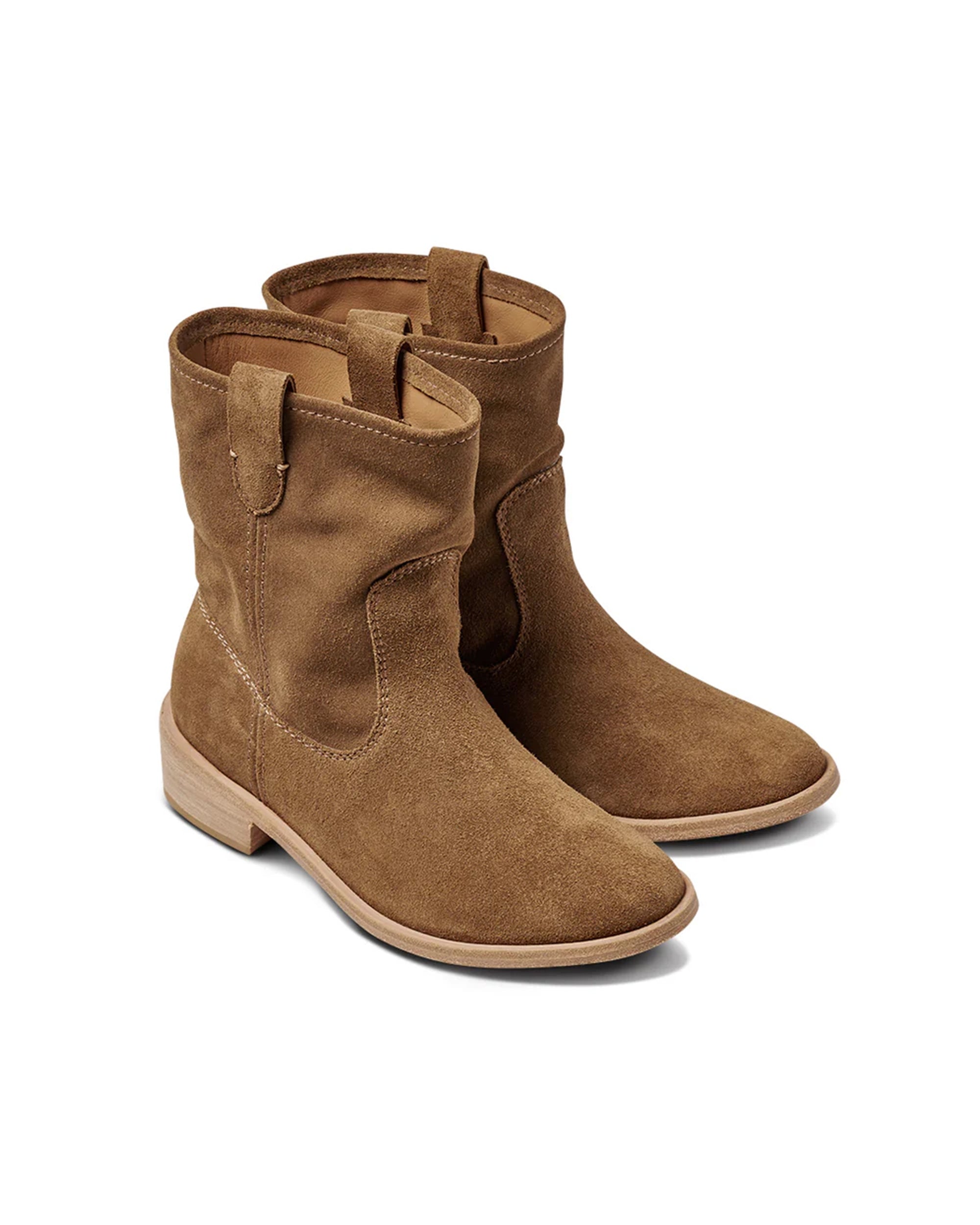 The Beek GROUSE boot is a mid-calf, light brown suede style with a slouchy silhouette, low wooden heel, and side pull tabs, shown on a white background.