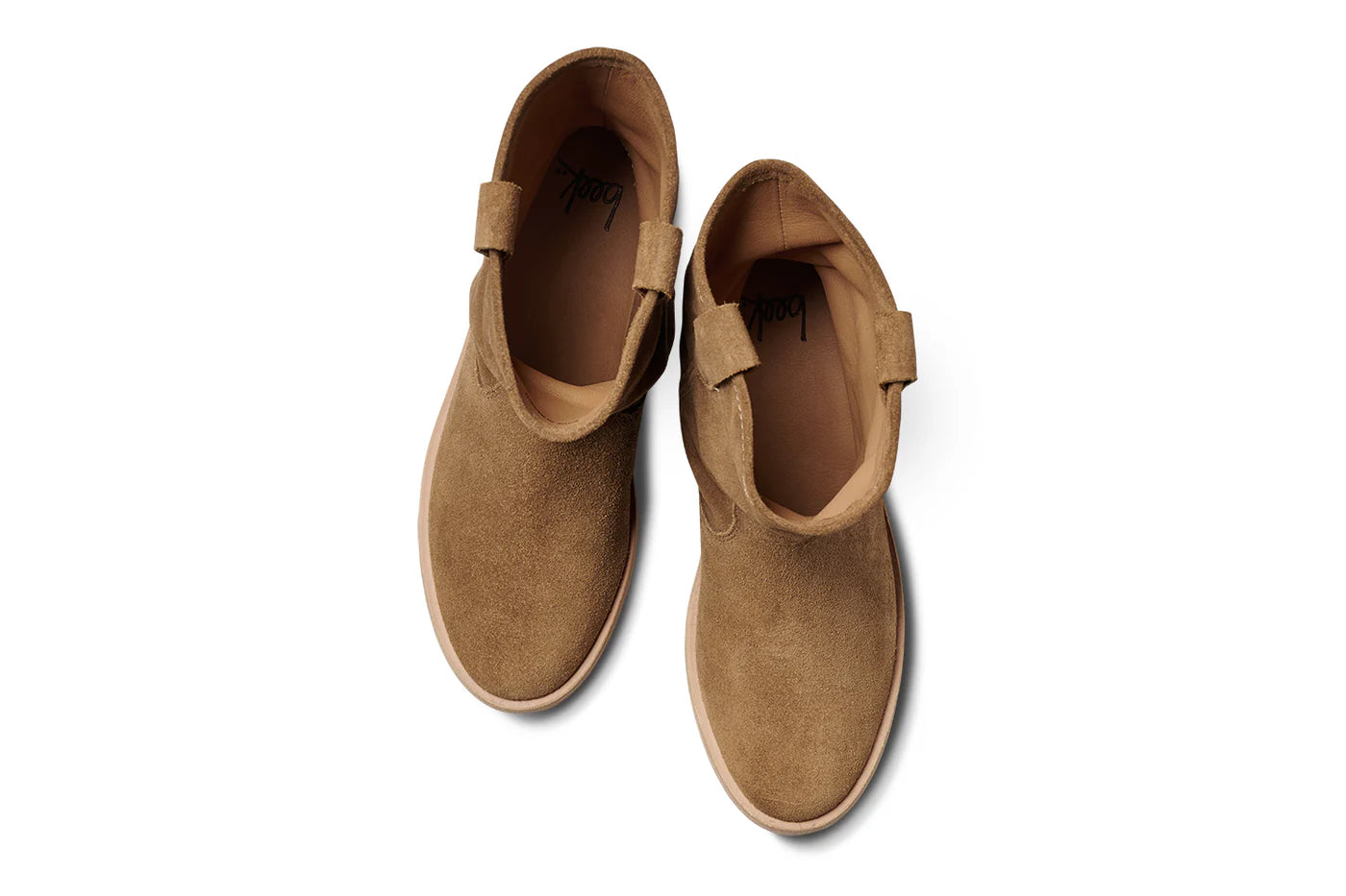 Top view of Beek's GROUSE boots in tan suede, featuring rounded toes, a slouchy silhouette, and pull-on tabs, shown on a white background.