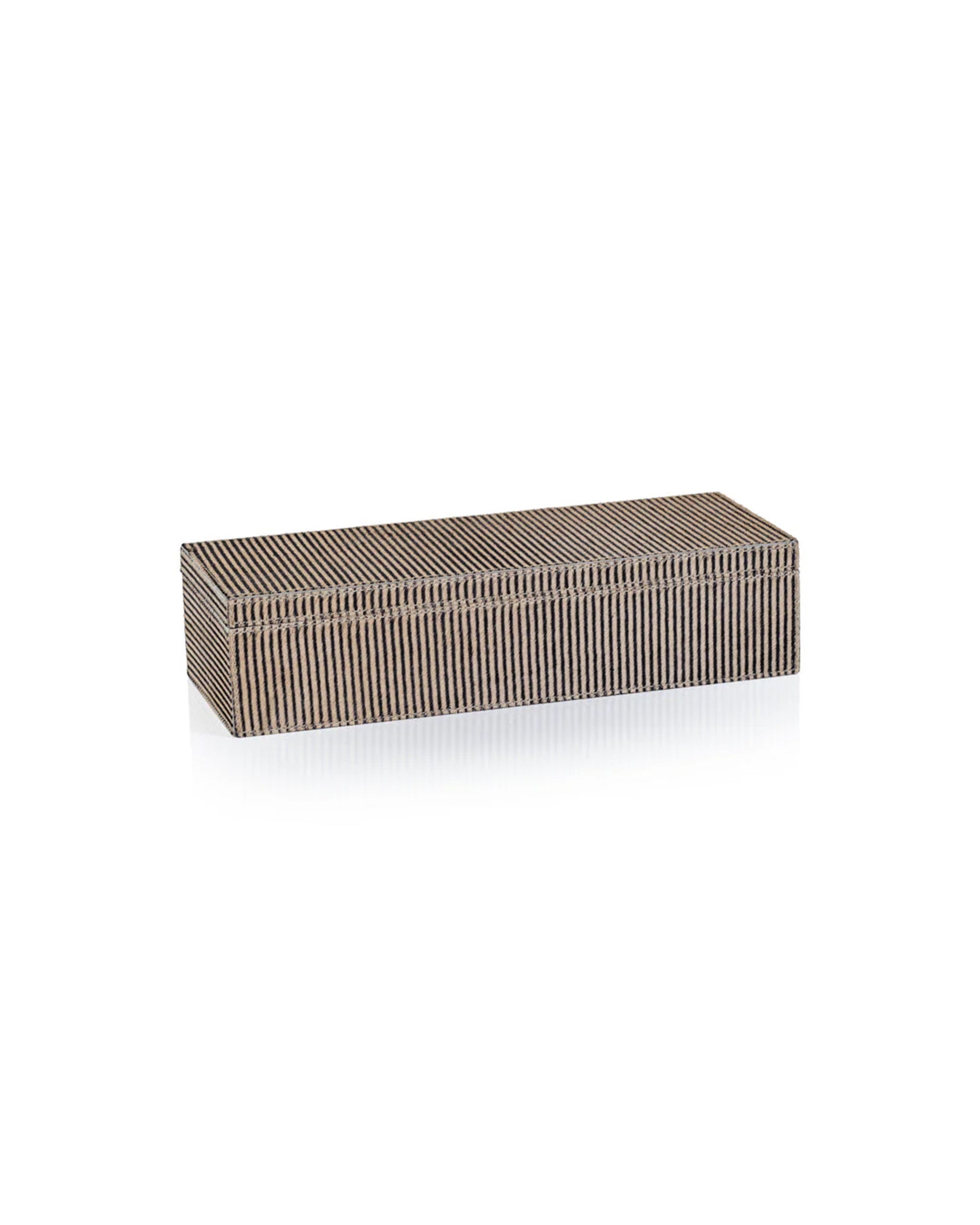 The Zodax IN-8015 Hair-On-Hide Leather Box showcases a rectangular shape with a brown and black striped texture—ideal for luxurious storage—shown here against a white background.