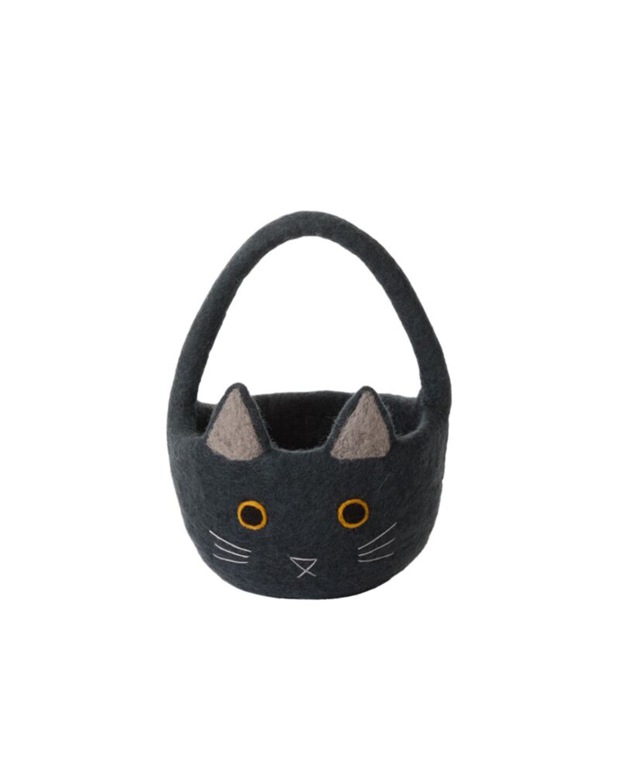 The Accent Decor Tricks & Treats Basket is a small, dark gray felt Halloween basket with a handle, embroidered cat face details, pointy ears, yellow eyes, pink inner ears, and white whiskers—ideal for trick-or-treating or festive decor.