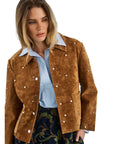 Hunter Bell NYC Hanlin Jacket in blue styled with a patterned skirt, shown against a white background.