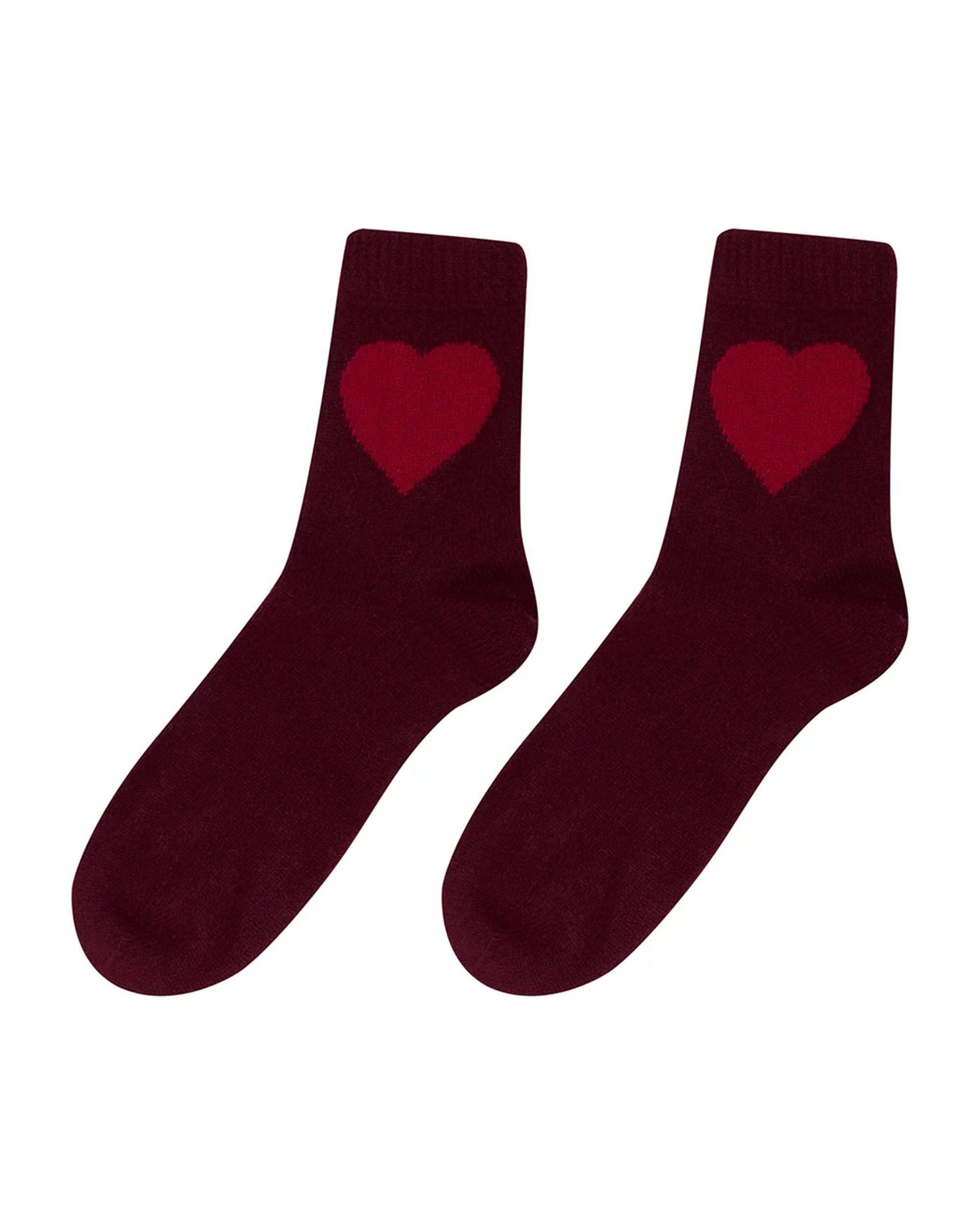 Heart Socks by Jumper 1 2 3 4/CR2: a pair of maroon cashmere socks with red heart designs near the top, shown side by side on a white background.