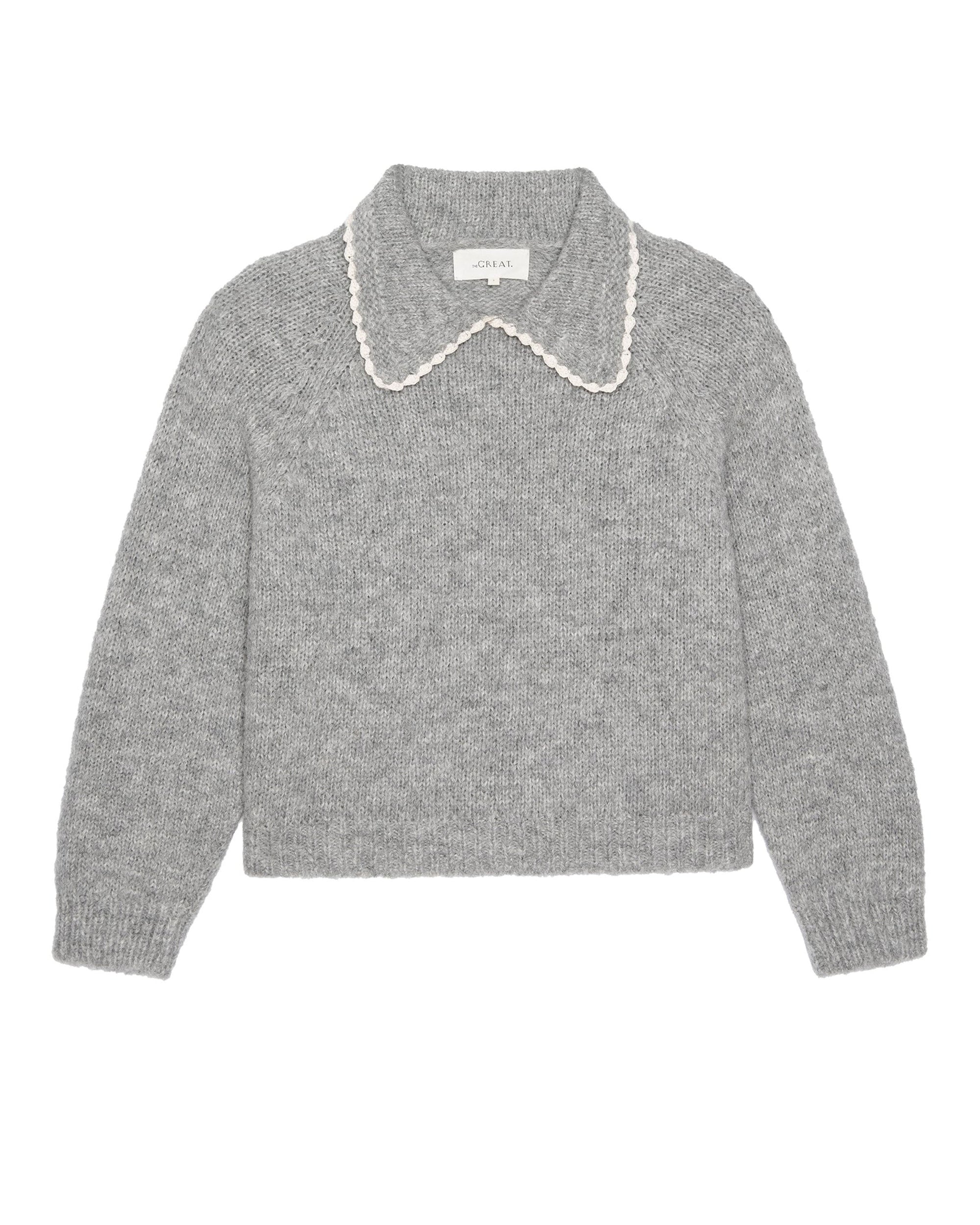 The Crochet Collar Pullover by The Great Inc. is a gray plush knit sweater featuring long sleeves and a wide crochet collar with white scalloped trim, shown laid flat on a white background.
