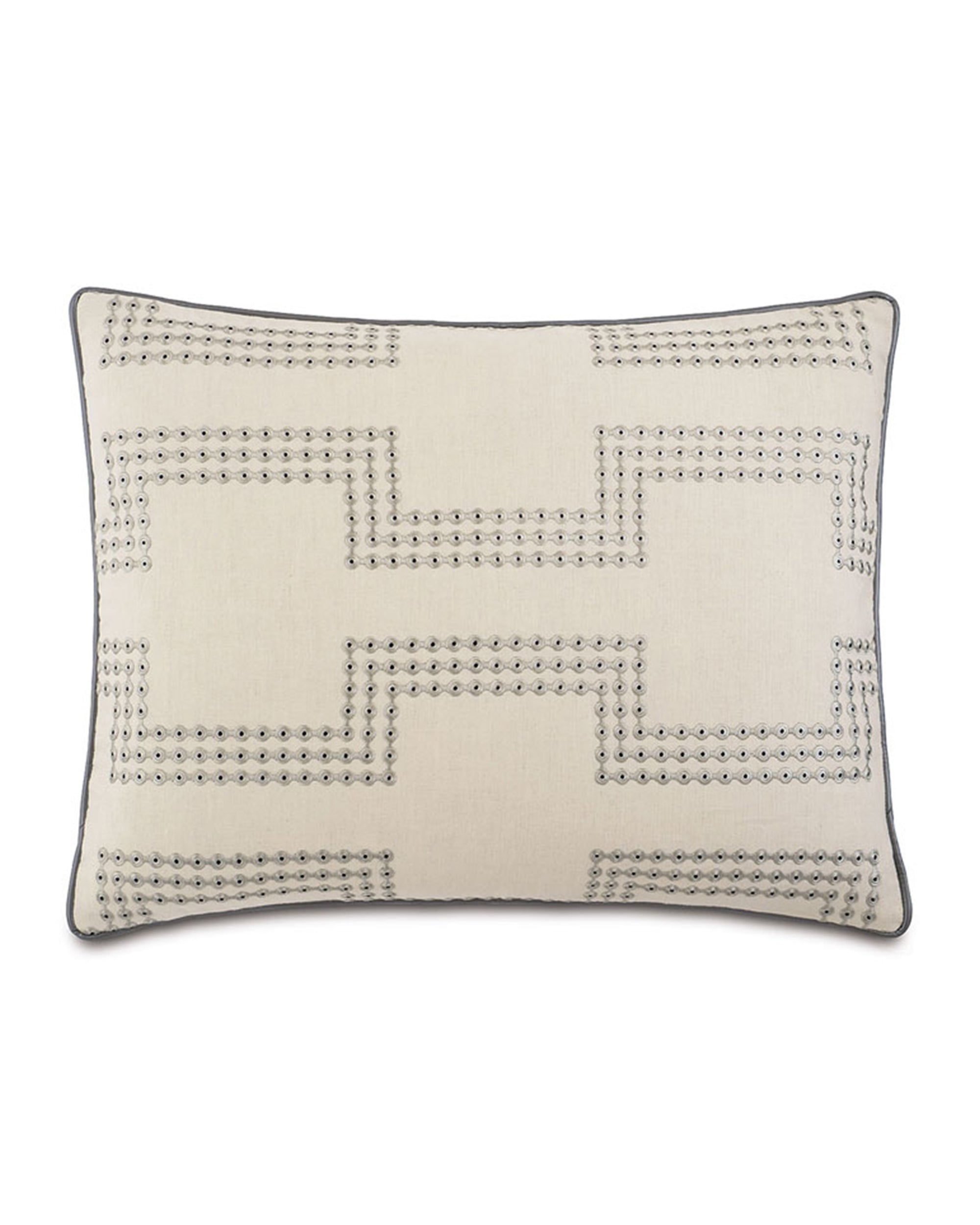 The Eastern Accents STN-395 Hendrix Stone Sham is a rectangular cotton-linen pillow in light beige, adorned with a silver geometric Greek key pattern of metallic studs and finished with dark piping.