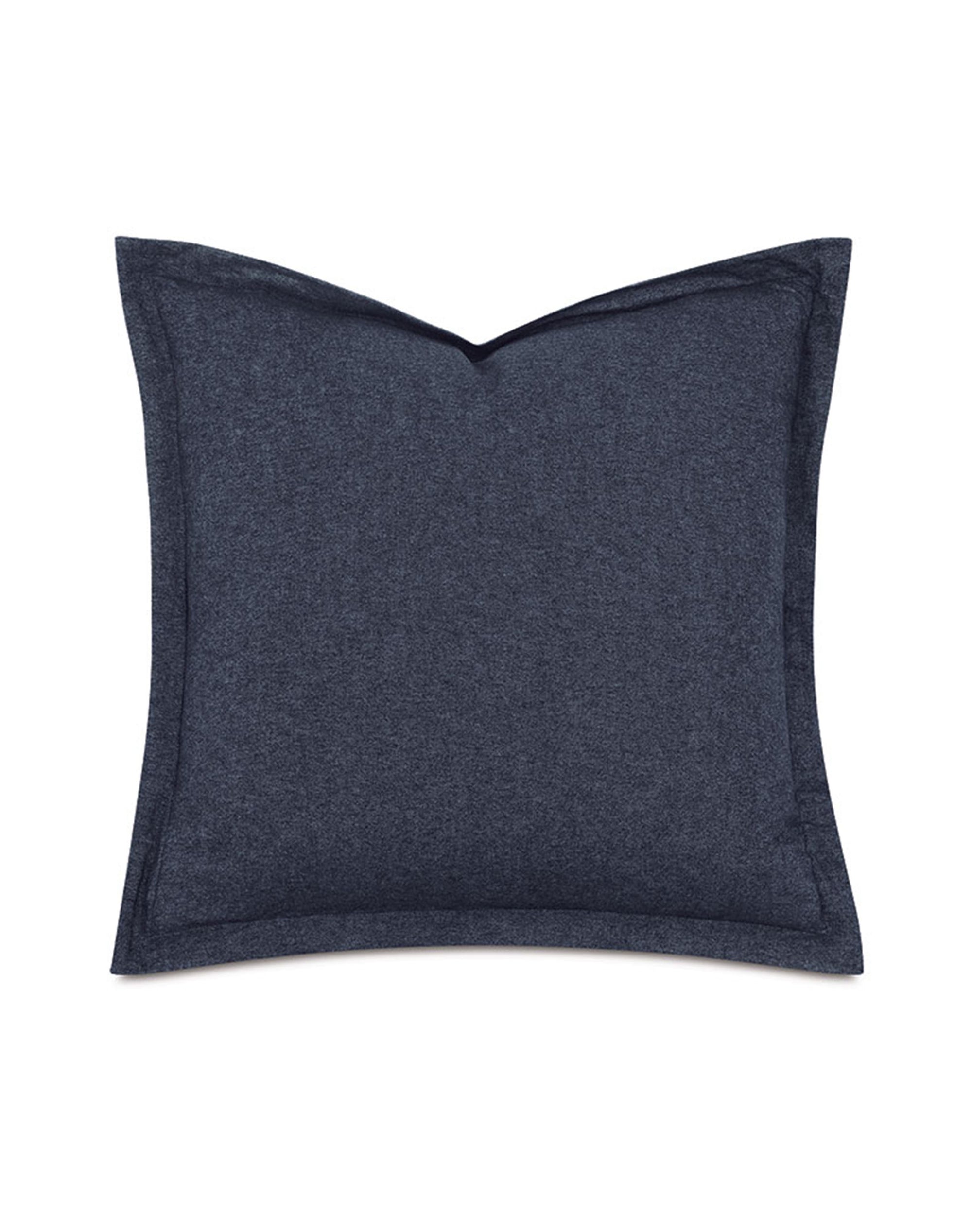 The HIG-12 HIGGINS DENIM pillow by Eastern Accents is a square, dark blue decorative cushion with visible edge seams, shown on a white background.