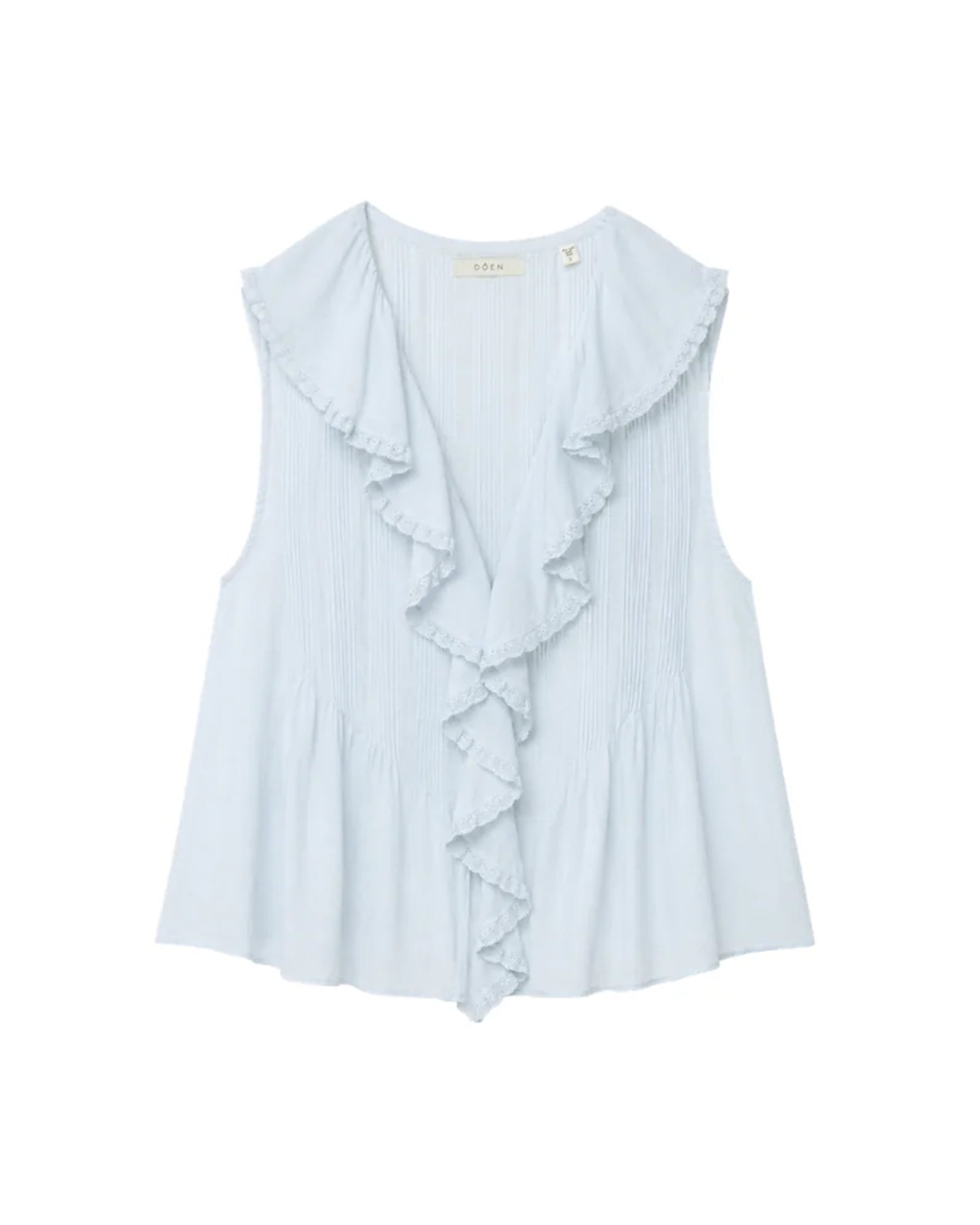 The Hilda Top by DOEN is a sleeveless, light blue blouse featuring lace-trimmed ruffles at the V-neck and front pleats. Made from lightweight organic cotton, it's a flowy piece ideal for warm weather.